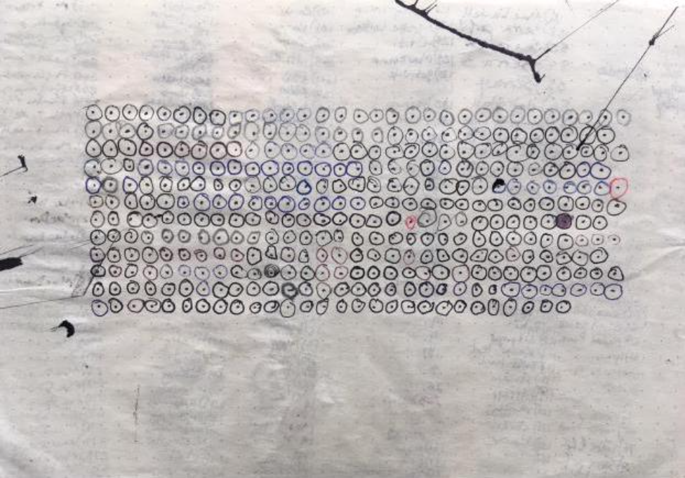 A rectangular cluster of small black dots populate an ink-spattered page. Circles in black, red, and pencil surround each small black dot. Text on the opposite side of the page bleeds through. Image courtesy of the artist. 