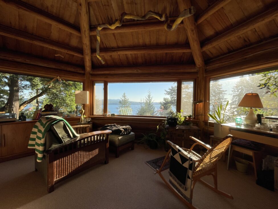 Room available to artists at Oak Head with panoramic view of the Hood Canal. Olympic Peninsula, Washington. Sculpture hanging from ceiling by Portland-based artist Molly Alloy. Photo credit to Roya Amirsoleymani.