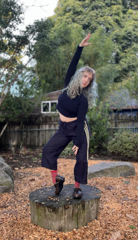 Colorful photo of a dancer outside. 