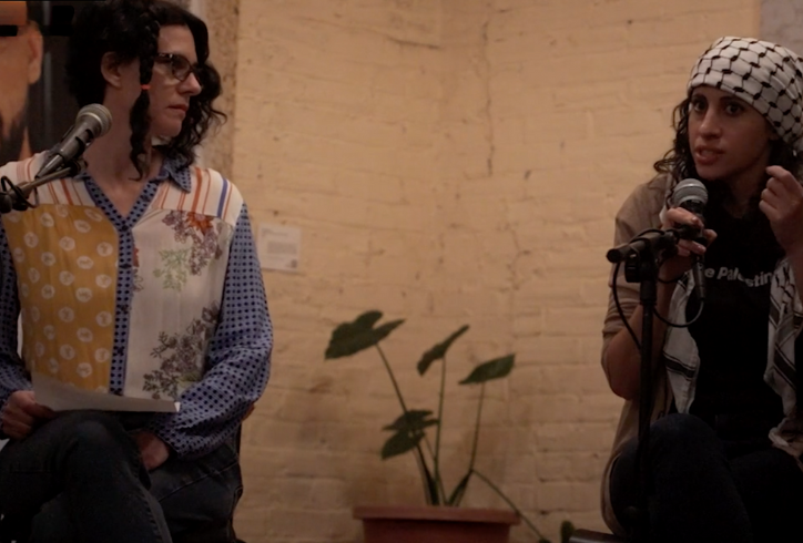 A photo of two people seated engaged in conversation, Nicole Bindler and Leila Mire. Photo courtesy of artist.