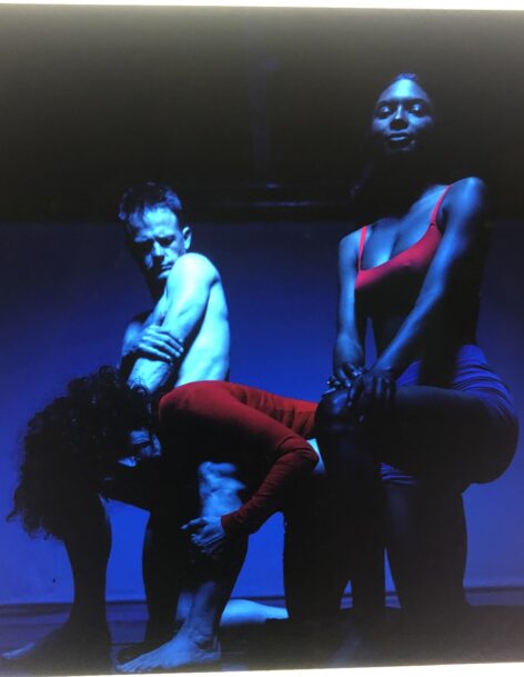 Trishawna Woods, Laura Quattrocchi and Joshua Bisset all posing and bathed in blue light Photo by Darrien Pope.