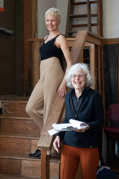 Two women laughing together, looking into the camera. Image by Jano Cohen