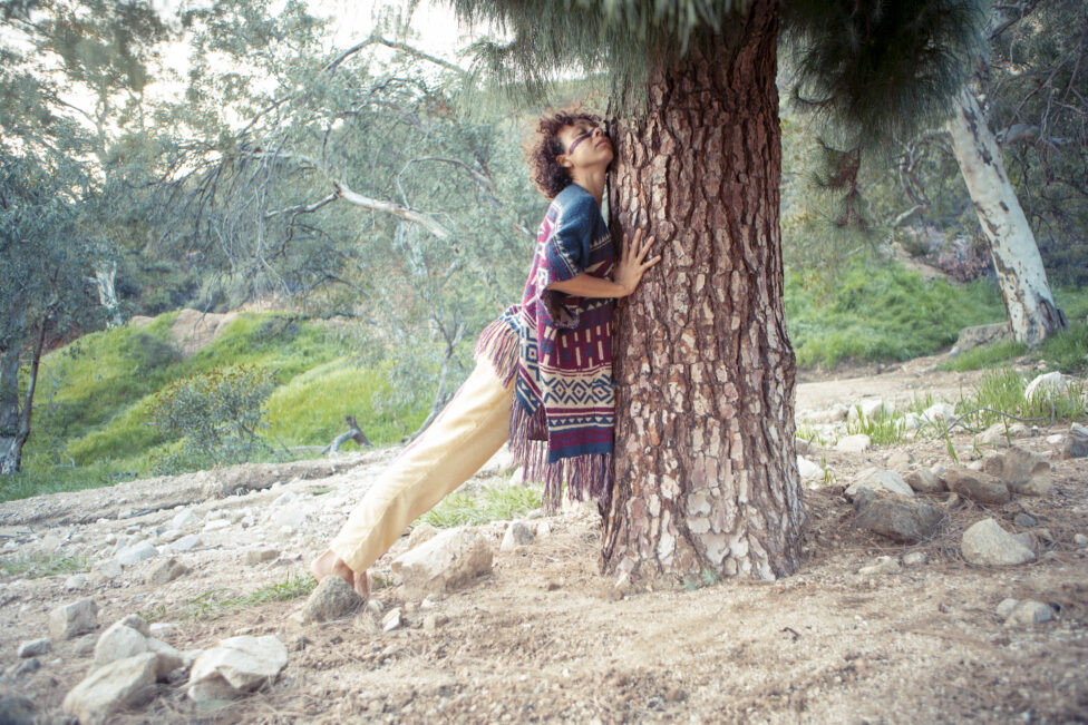 Lindsey leaning against a tree. Photo by Isabel Avila.