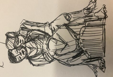 The image is a black-and-white sketch depicting two figures in an intimate embrace. One person sits in the lap of the other, held gently in their arms, creating a sense of protection and closeness. Loose, expressive lines convey the figures’ forms and posture, with minimal facial detail, emphasizing emotion over precision. The style is quick and energetic, capturing the immediacy of the moment. The overall mood is somber and reflective, with a quiet, tender melancholy, highlighting vulnerability, care, and human connection in a fleeting, heartfelt moment. Image by Cassandre Charles.