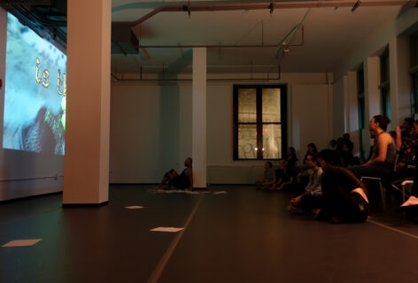 2019 Open Performance; artists share work in progress on a projector in front of an audience. .Photo by Harry Shunyao Zhang.
